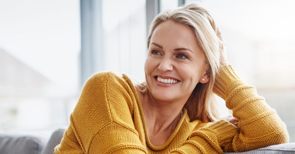 Yourhful looking woman after a facelift procedure. (Model)